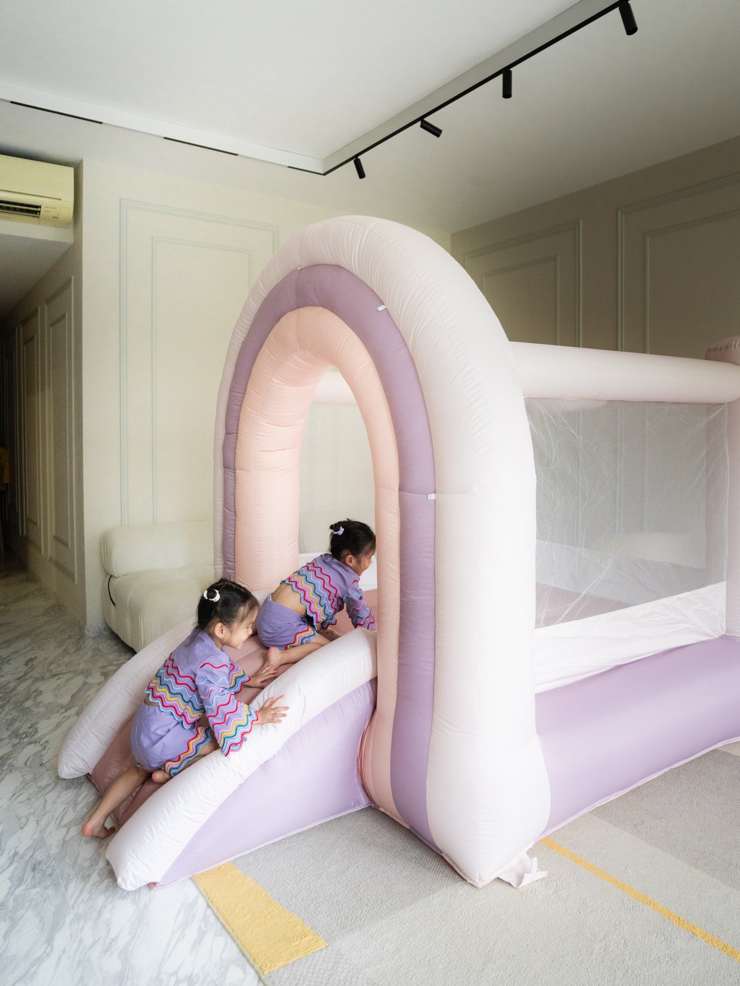 COTTON CANDY RAINBOW BOUNCE HOUSE