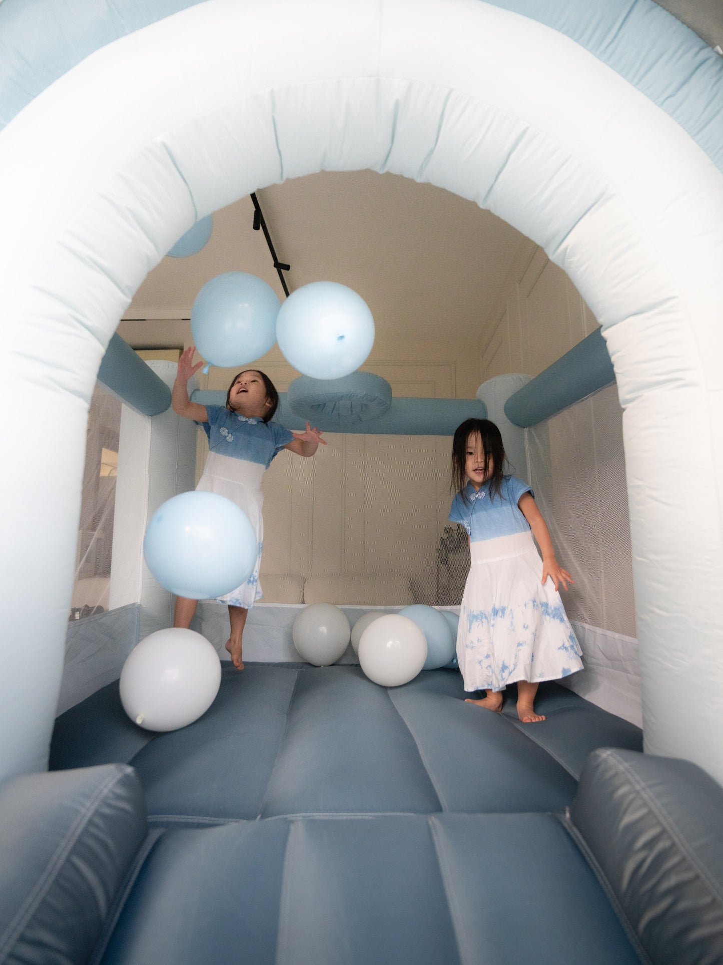 OCEAN BLUE RAINBOW BOUNCE HOUSE